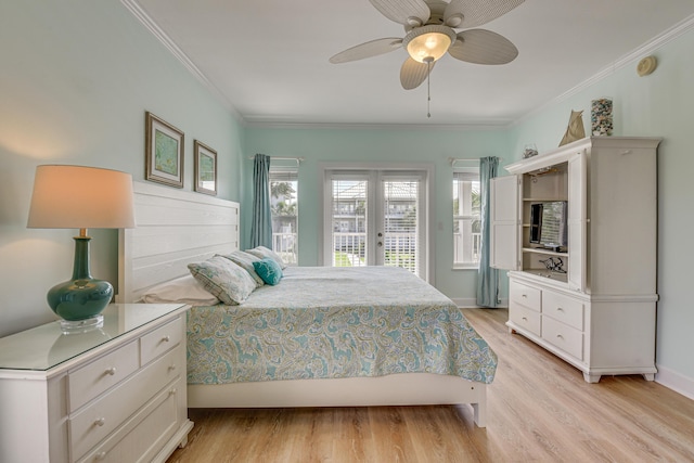2410 Scenic Gulf Dr Unit 101C, Miramar Beach, FL 32550 - bedroom with ornamental molding, access to exterior, light wood-type flooring, a ceiling fan, and baseboards
