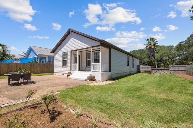 518 Second Ave, Destin, FL 32541 - rear view of property with crawl space, a patio, and a porch