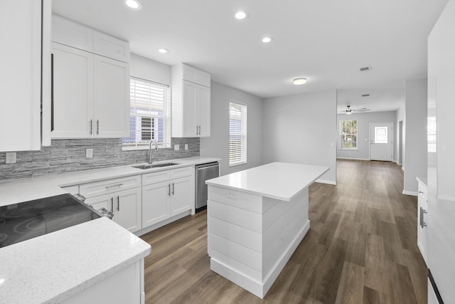 518 Second Ave, Destin, FL 32541 - kitchen with a sink, dishwasher, decorative backsplash, dark wood-type flooring, and recessed lighting