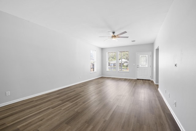 518 Second Ave, Destin, FL 32541 - empty room with ceiling fan, dark wood-style flooring, and baseboards