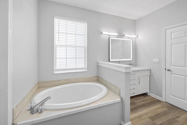 518 Second Ave, Destin, FL 32541 - bathroom featuring vanity, a bath, and healthy amount of natural light