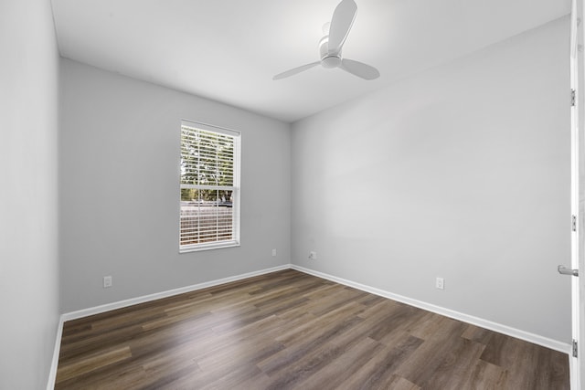 518 Second Ave, Destin, FL 32541 - spare room with dark wood finished floors, ceiling fan, and baseboards