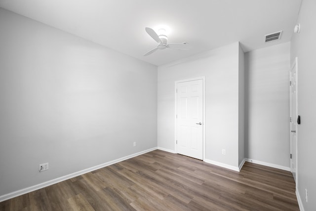 518 Second Ave, Destin, FL 32541 - unfurnished bedroom featuring dark wood-type flooring, baseboards, and ceiling fan