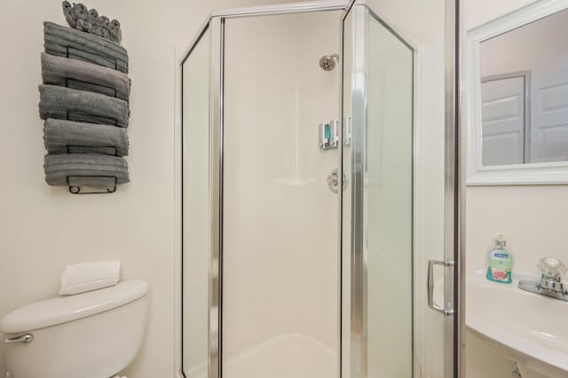 34 Herons Watch Way Unit 2303, Santa Rosa Beach, FL 32459 - full bathroom with toilet, a shower stall, and a sink