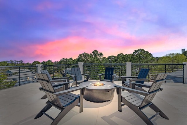 136 Lee Pl, Santa Rosa Beach, FL 32459 - patio terrace at dusk with a fire pit