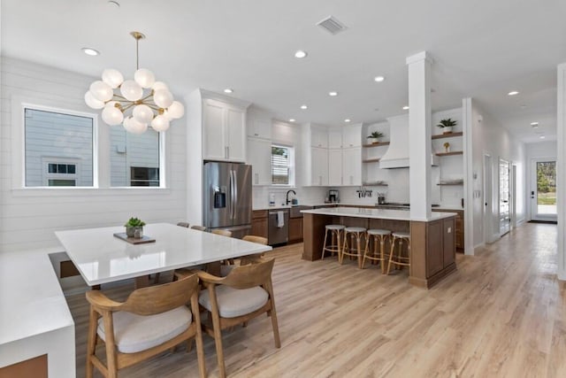 136 Lee Pl, Santa Rosa Beach, FL 32459 - dining area with a chandelier, light wood-type flooring, and recessed lighting