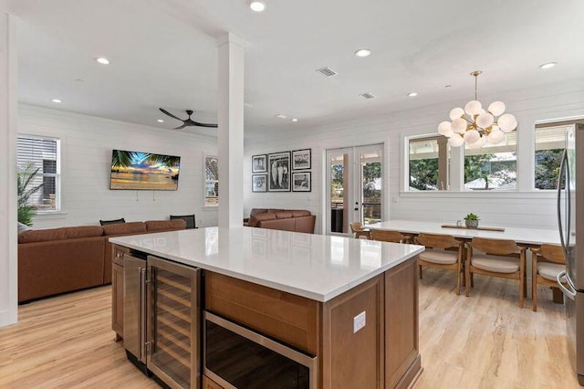 136 Lee Pl, Santa Rosa Beach, FL 32459 - kitchen with beverage cooler, open floor plan, healthy amount of natural light, and recessed lighting