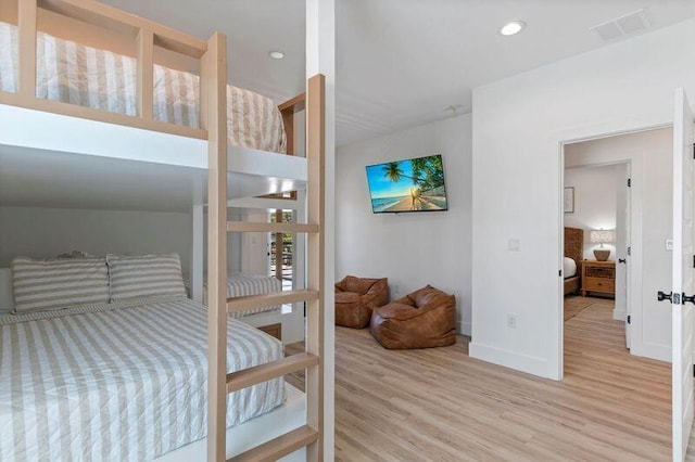 136 Lee Pl, Santa Rosa Beach, FL 32459 - bedroom featuring wood finished floors, baseboards, and recessed lighting