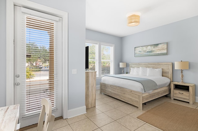 431 La Valencia Cir, Panama City Beach, FL 32413 - bedroom featuring light tile patterned flooring and baseboards