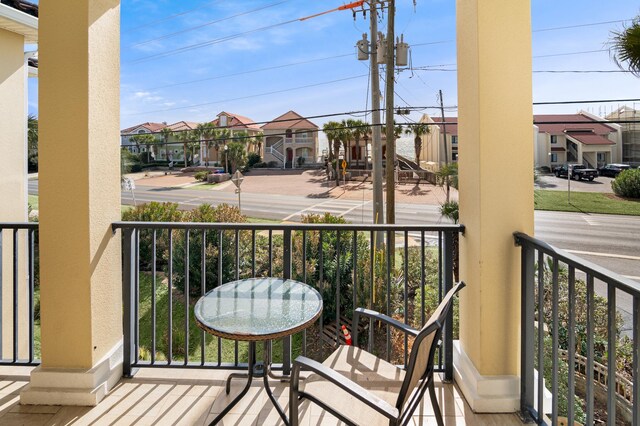 431 La Valencia Cir, Panama City Beach, FL 32413 - covered porch featuring a residential view