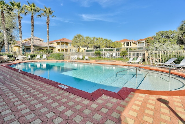 431 La Valencia Cir, Panama City Beach, FL 32413 - community pool with a patio