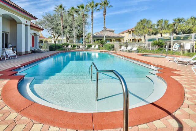 431 La Valencia Cir, Panama City Beach, FL 32413 - community pool featuring a patio area