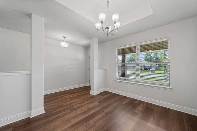 103 Ridgeway Cir, Crestview, FL 32536 - unfurnished room with wood finished floors, a chandelier, and baseboards