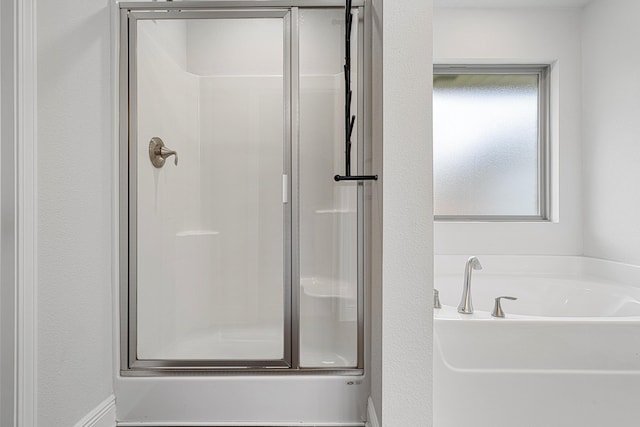 103 Ridgeway Cir, Crestview, FL 32536 - bathroom featuring a stall shower and a bath