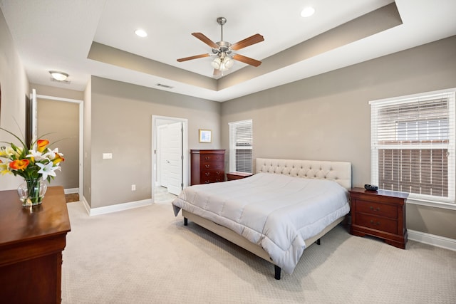 20 6th Ave, Shalimar, FL 32579 - carpeted bedroom with a tray ceiling, baseboards, recessed lighting, and ceiling fan