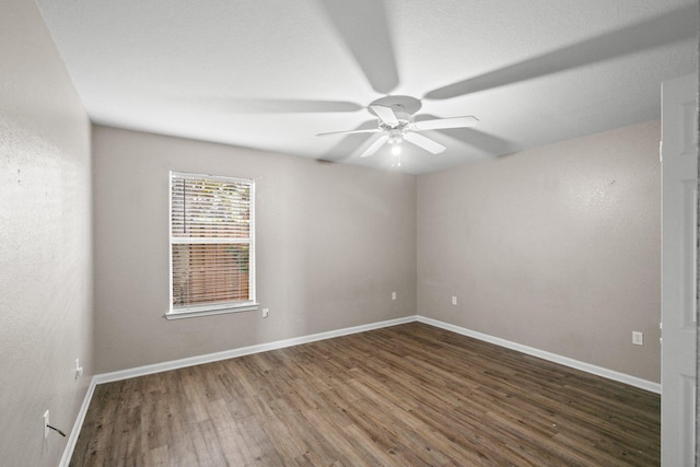 1014 Airport Rd Unit 155, Destin, FL 32541 - spare room with ceiling fan, wood finished floors, and baseboards