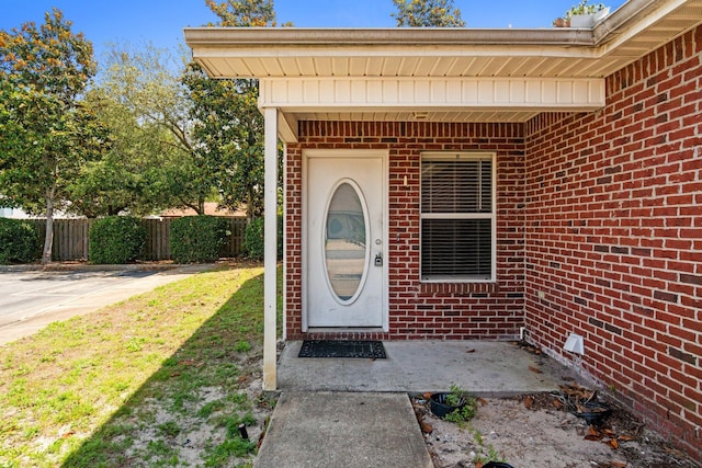 1014 Airport Rd Unit 155, Destin, FL 32541 - doorway to property with brick siding