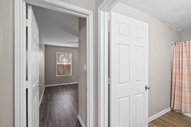 1014 Airport Rd Unit 155, Destin, FL 32541 - corridor with wood finished floors and baseboards