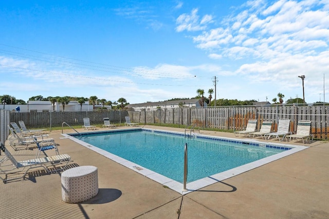 1014 Airport Rd Unit 155, Destin, FL 32541 - community pool featuring a patio area