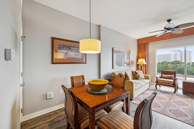 5000 S Sandestin Blvd Unit 6407, Miramar Beach, FL 32550 - dining space featuring wood finished floors, baseboards, and ceiling fan