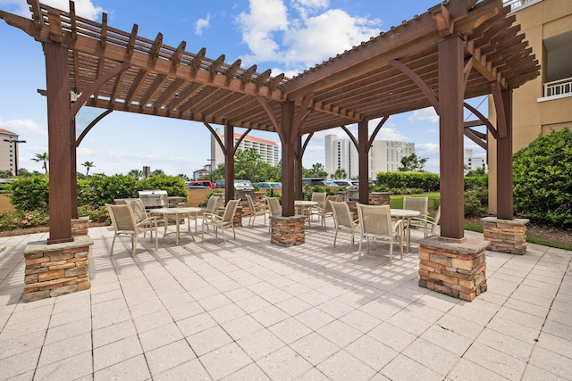 5000 S Sandestin Blvd Unit 6407, Miramar Beach, FL 32550 - view of patio / terrace with outdoor dining area and a pergola