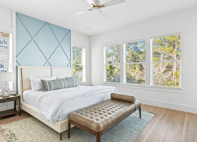 205 Redbud Ln, Inlet Beach, FL 32461 - bedroom with light wood-style floors, baseboards, and a ceiling fan