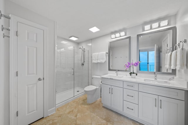 17545 Front Beach Rd Unit 1301, Panama City Beach, FL 32413 - full bath featuring toilet, a stall shower, double vanity, and tile patterned flooring