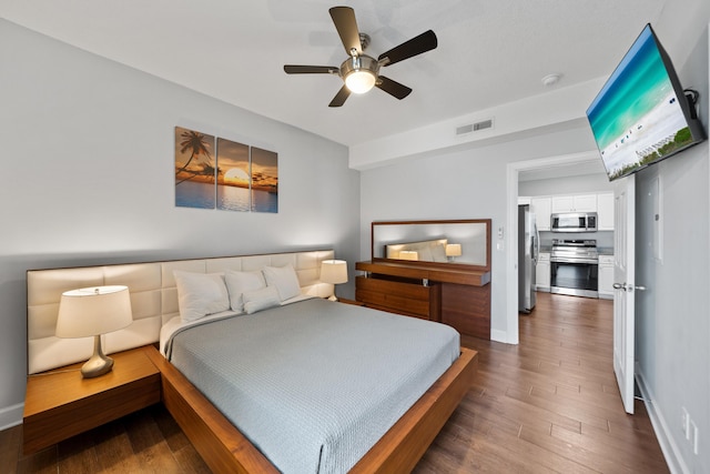 17545 Front Beach Rd Unit 1301, Panama City Beach, FL 32413 - bedroom featuring freestanding refrigerator, wood finished floors, baseboards, and ceiling fan