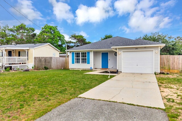 1951 Ambassador Dr, Gulf Breeze, FL 32563 - single story home featuring an attached garage, driveway, a shingled roof, and a porch