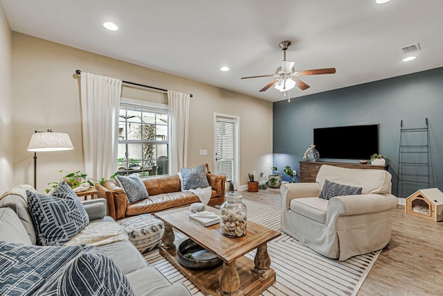 8726 Brown Pelican Cir, Navarre, FL 32566 - living area with a ceiling fan, wood finished floors, and recessed lighting