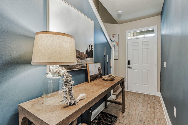 8726 Brown Pelican Cir, Navarre, FL 32566 - entrance foyer with wood finished floors and baseboards