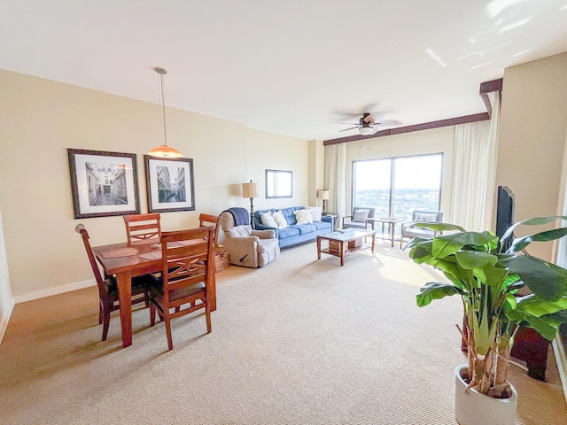 15100 Front Beach Rd Unit 831, Panama City Beach, FL 32413 - dining space with light carpet, a ceiling fan, and baseboards