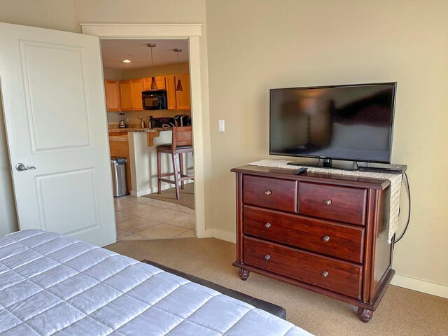 15100 Front Beach Rd Unit 831, Panama City Beach, FL 32413 - bedroom featuring light carpet and baseboards