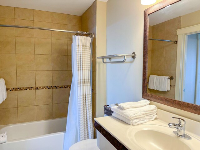 15100 Front Beach Rd Unit 831, Panama City Beach, FL 32413 - bathroom featuring shower / bathtub combination with curtain, vanity, and toilet