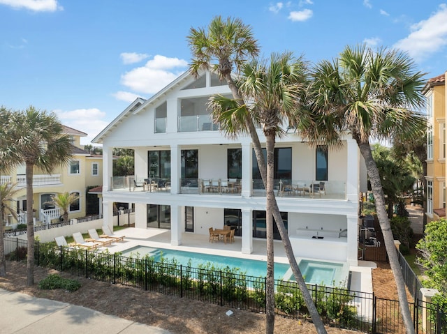 4658 Destiny Way, Destin, FL 32541 - back of house featuring a balcony, a fenced backyard, a patio, stucco siding, and outdoor dining area
