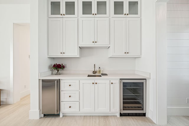 4658 Destiny Way, Destin, FL 32541 - indoor bar featuring wine cooler, light wood finished floors, stainless steel fridge, and baseboards