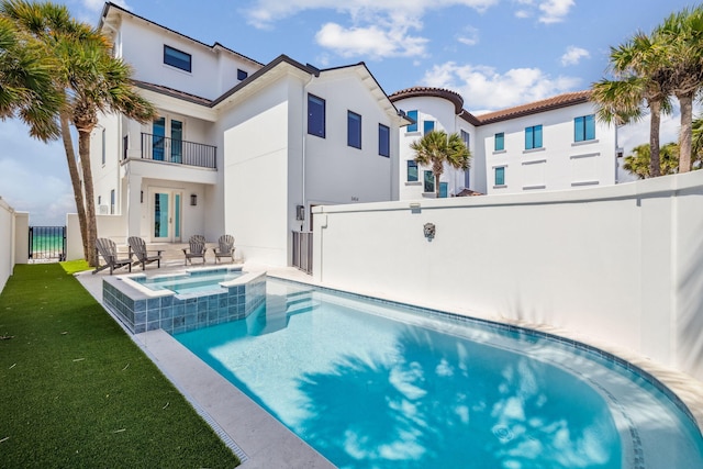 3464 Scenic Highway 98, Destin, FL 32541 - view of swimming pool with french doors, a pool with connected hot tub, and a patio area