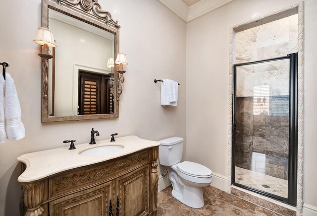 17 Saint Martin Cir, Miramar Beach, FL 32550 - bathroom with vanity, toilet, a stall shower, baseboards, and ornamental molding