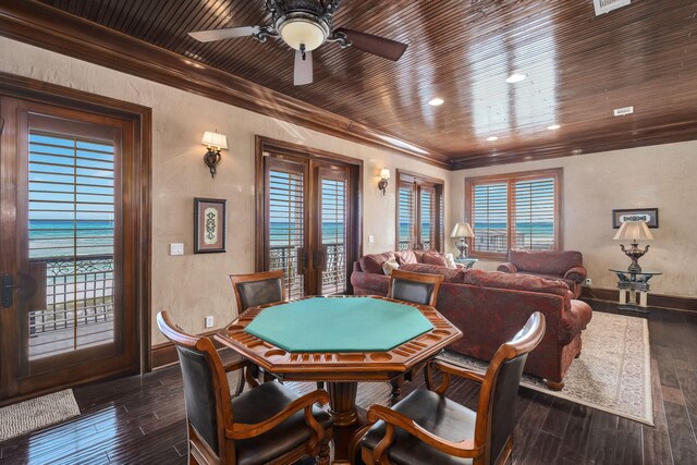 17 Saint Martin Cir, Miramar Beach, FL 32550 - dining area with french doors, ornamental molding, a textured wall, dark wood-style flooring, and a ceiling fan