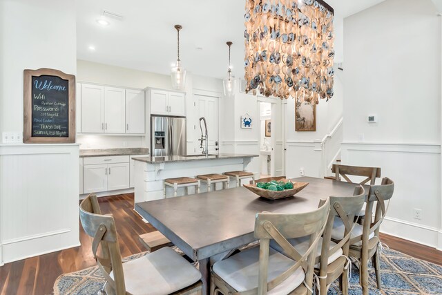 18 Eastern Lake Ct, Santa Rosa Beach, FL 32459 - dining room with dark wood-style floors, stairway, and recessed lighting