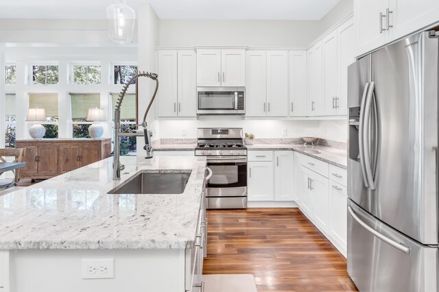 18 Eastern Lake Ct, Santa Rosa Beach, FL 32459 - kitchen with appliances with stainless steel finishes, a sink, white cabinetry, and dark wood-type flooring