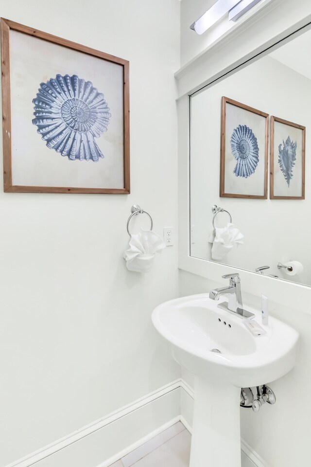 18 Eastern Lake Ct, Santa Rosa Beach, FL 32459 - bathroom with baseboards and a sink