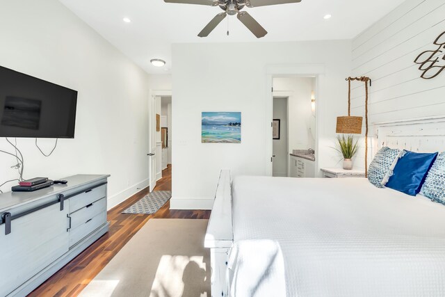 18 Eastern Lake Ct, Santa Rosa Beach, FL 32459 - bedroom featuring dark wood finished floors, recessed lighting, baseboards, a ceiling fan, and wood walls