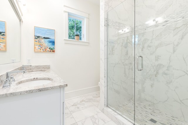 18 Eastern Lake Ct, Santa Rosa Beach, FL 32459 - bathroom with marble finish floors, a marble finish shower, double vanity, and baseboards