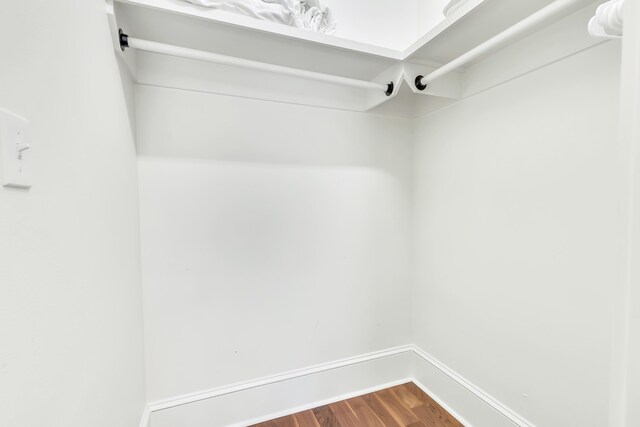 18 Eastern Lake Ct, Santa Rosa Beach, FL 32459 - walk in closet with dark wood finished floors