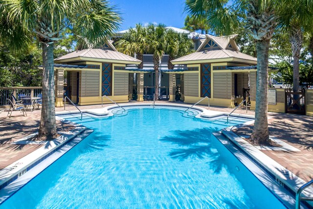 18 Eastern Lake Ct, Santa Rosa Beach, FL 32459 - community pool featuring a patio area