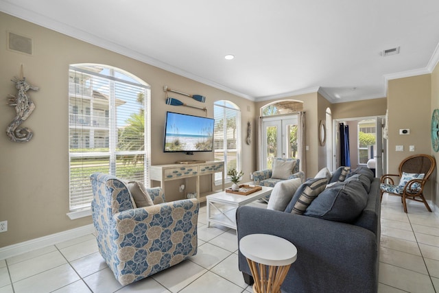 34 Opal Cv, Miramar Beach, FL 32550 - living room featuring baseboards, light tile patterned flooring, crown molding, and plenty of natural light