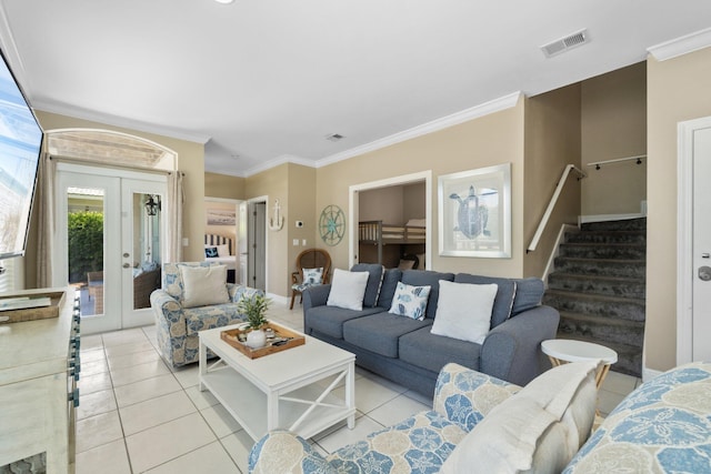 34 Opal Cv, Miramar Beach, FL 32550 - living area with light tile patterned floors, ornamental molding, stairs, and french doors