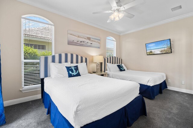 34 Opal Cv, Miramar Beach, FL 32550 - carpeted bedroom with ornamental molding, baseboards, and a ceiling fan