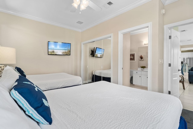 34 Opal Cv, Miramar Beach, FL 32550 - bedroom with ornamental molding, a closet, ensuite bathroom, ceiling fan, and carpet floors